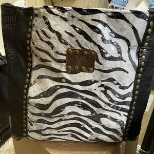 Zebra Print Shoulder Bag with Black Accents. Cowhide and Leather.